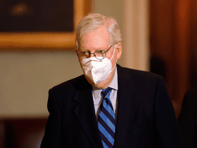 Former Senate majority leader Mitch McConnell leaves the chamber on Jan. 19, 2021 in Washington.