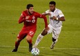 Plans have not been finalized, but Toronto FC midfielder Alejandro Pozuelo and his teammates (left) are hoping to play games at home this season. USA TODAY