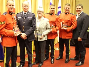 RCMP investigators who worked on Project Caboche: Patrick Sestier, Josée Pelletier (holding award), Karim Mahrady  and Jacques Thébere with Corp. Serge Bilodeau, president of the Quebec RCMP Members Association. Photo was taken at the Quebec Police Awards Gala in Montreal in 2019.