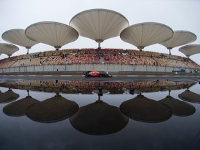 Red Bull's Australian driver Daniel Ricciardo steers his car during the first practice of the Formula One Chinese Grand Prix in Shanghai on April 7, 2017.