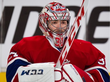 Montreal Canadiens goalie Carey Price looks on during warmup before their third NHL Eastern Conference quarterfinal playoff game against the Tampa Bay Lightning at the Bell Centre in Montreal on Sunday, April 20, 2014.