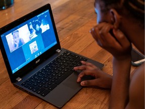 Gymnast Ty-La Morris, 12, prepares to train via Zoom at her New York home in May 2020.