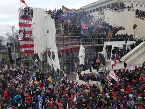 A mob of supporters of U.S. President Donald Trump storm the U.S. Capitol Building in Washington, U.S., Jan. 6, 2021.