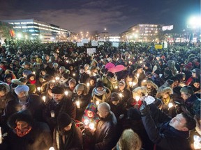 Six people were killed in the shooting at the Islamic Cultural Centre of Quebec City on Jan. 29, 2017. Above: a vigil held the following day.