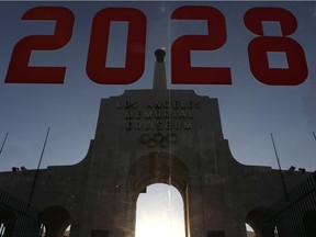 A LA2028 sign is seen at the Los Angeles Coliseum to celebrate Los Angeles being awarded the 2028 Olympic Games, in Los Angeles on Sept. 13, 2017.