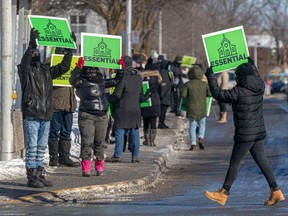 Members of the Good News Chapel protested against the closing of churches at the corner of Lacordaire and Couture Blvds. in St-Leonard in January.