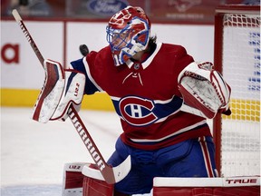 Montreal Canadiens' Carey Price makes a blocker save during against the Vancouver Canucks in Montreal on Feb. 1, 2021.