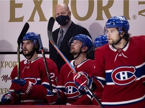 Montreal Canadiens head coach Claude Julien behind the bench during NHL action against Vancouver Canucks in Montreal on Feb. 1, 2021.