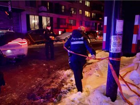 Police cordon off Anvers Ave. in Parc-Extension after an alleged altercation between a police officer and a driver a few blocks away on Thursday, Jan. 28, 2021.