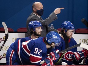 Montreal Canadiens head coach Claude Julien gives instructions from behind the bench during game against the Ottawa Senators in Montreal on Feb. 4, 2021.