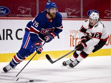 Ottawa Senators defenseman Thomas Chabot (72) chases Montreal Canadiens defenseman Jeff Petry (26) at the Bell Centre Thursday, Feb. 4, 2021.