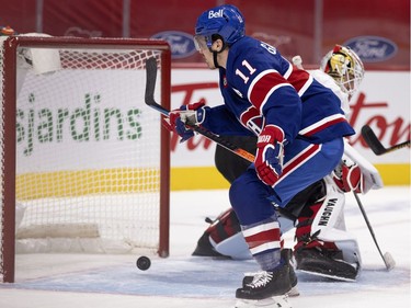 Montreal Canadiens right wing Brendan Gallagher (11) opens the scoring against Ottawa Senators goaltender Matt Murray (30) at the Bell Centre in Montreal on Thursday, Feb. 4, 2021.