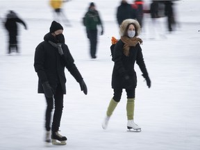 Montrealers enjoy a nice wintery day of staking at Lafontaine park on Feb. 7, 2021.