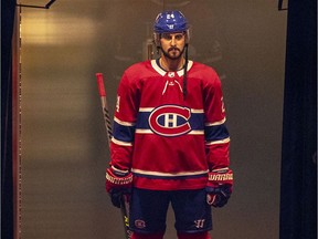 Canadiens Phillip Danault waits in a hallway outside the dressing room waiting to go onto the ice for National Hockey League game against the Toronto Maple Leafs in Montreal on Feb. 10, 2021.