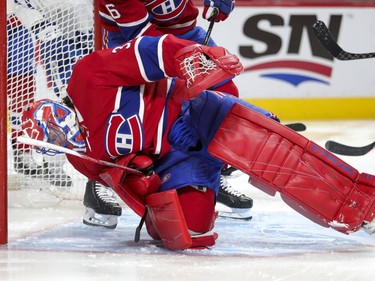 Carey Price freezes the puck during second period at the Bell Centre on Wednesday, Feb. 10, 2021.