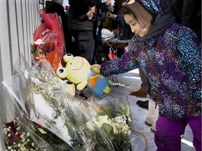 Flowers and stuffed toys are placed at a shrine for Meriem Boundaoui on Feb. 14.