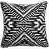 Graphic black and white help to update the great outdoors. Jute Geo outdoor pillow, $25, Lowes.ca