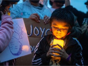 Joyce Echaquan, a 37-year-old Atikamekw woman, died at Joliette hospital after she posted a video of slurs said by staff right before her death. A vigil was held in her honour in Saint-Charles-Borromee on Tuesday Sept. 29, 2020. Above: 5-year-old Luca Dubé at the vigil.