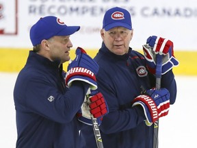 Montreal Canadiens head coach Claude Julien, right, speaks with associate coach Kirk Muller practice at the Bell Sports Complex in Brossard on Wednesday November 27, 2019.  (John Mahoney} / MONTREAL GAZETTE)  ORG XMIT: POS1911271253161652