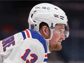 Alexis Lafrenière of the New York Rangers looks on against the Washington Capitals at Capital One Arena on February 20, 2021 in Washington, DC.