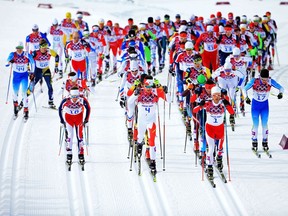 Sjur Roethe of Norway, Alex Harvey of Canada and Martin Johnsrud Sundby of Norway lead the pack in the Men's Skiathlon 15 km Classic and 15 km Free at the 2014 Winter Olympics in Sochi, Russia. A study of elite athletes suggested endurance athletes — a category including cross-country skiers — had the greatest boost in life expectancy.