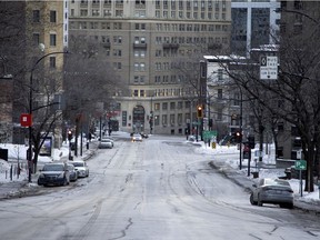 A normally busy Cote-des-neiges street is near empty during the morning rush hour as the city continues to deal with the pandemic on Feb. 11, 2021.