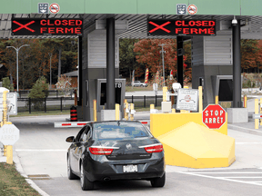 A car waits to enter a checkpoint to enter Canada at the Canada-United States border crossing in Lansdowne, Ont., on Sept. 28, 2020.