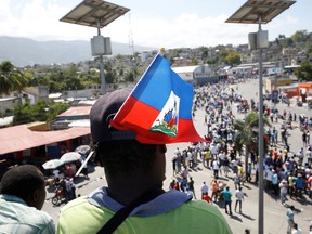 Demonstrators take part in a protest against Haiti's President Jovenel Moise, in Port-au-Prince, Haiti February 14, 2021.