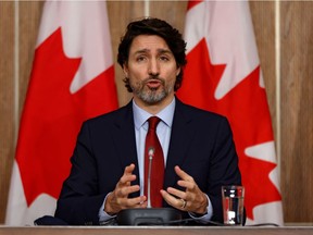 Canada's Prime Minister Justin Trudeau takes part in a news conference, as efforts continue to help slow the spread of the coronavirus disease (COVID-19), in Ottawa, Ontario, Canada February 19, 2021. REUTERS/Blair Gable