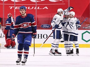 Toronto Maple Leafs players celebrate after second-period goal by Mitch Marner on Canadiens goalie Carey Price Saturday night at the Bell Centre in Montreal.