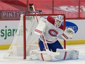 Canadiens goalie Jake Allen (34) makes a save in the second period against the Ottawa Senators at the Canadian Tire Centre in Ottawa on Sunday.