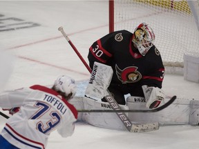 Montreal Canadiens' Tyler Toffoli scores against Ottawa Senators goalie Matt Murray during the third period at the Canadian Tire Centre in Ottawa on Feb. 23, 2021.