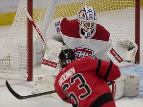 Goalie Jake Allen makes a save on a shot from Senators' Evgenii Dadonov in the third period at the Canadian Tire Centre in Ottawa on Saturday, Feb. 6, 2021.