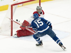 Toronto Maple Leafs centre Alexander Kerfoot shoots on Montreal Canadiens goaltender Carey Price during the first period at Scotiabank Arena in Toronto on Feb. 13, 2021.