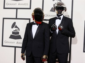 FILE PHOTO: Daft Punk arrive at the 56th annual Grammy Awards in Los Angeles, California January 26, 2014.      REUTERS/Danny Moloshok /File Photo