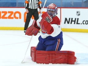 Montreal Canadiens goaltender Carey Price snags a Winnipeg Jets shot in Winnipeg Feb. 25, 2021.
