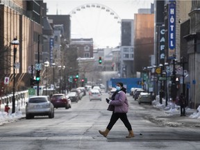 MONTREAL, QUE.: JANUARY 10, 2021 --  Nearly deserted St Denis street on Sunday January 10, 2021 during the COVID-19 pandemic, following the first night of the curfew. (Pierre Obendrauf / MONTREAL GAZETTE) ORG XMIT: 65585