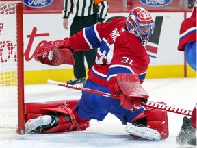 Carey Price appeared to suffer an injury during the second period of Monday night's 3-2 overtime win over the Edmonton Oilers at the Bell Centre.