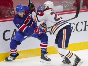 Canadiens' Shea Weber fights off check by  Oilers' Darnell Nurse during first period at the Bell Centre in February.