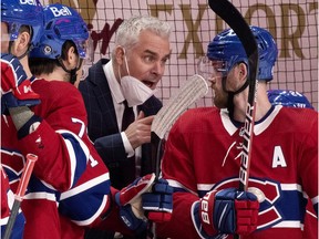 Montreal Canadiens interim head coach Dominique Ducharme speaks to left-winger Paul Byron during game against the Ottawa Senators in Montreal on March 2, 2021.