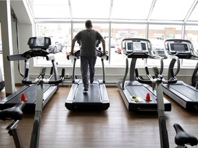 A client has the row of treadmills to himself at Complexe Médico-Sportif Évolution in Granby. While gyms are allowed to reopen in orange zones, they are running at less than 50 per cent of their capacity.