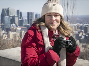 Child therapist Dana Even with her camera at the Westmount lookout.  Even figured out a novel way to beat the pandemic blues. She decided to catch sunrises since the fall and photograph them. She completed her 100th last Thursday, to mark the first anniversary of COVID-19.