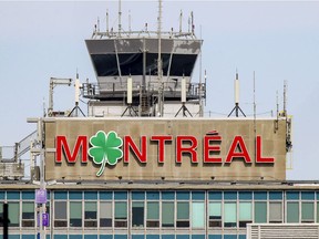 A shamrock replaces the O on the sign atop the terminal at Trudeau Airport on Tuesday, March 16, 2021 the day before St. Patrick's Day.