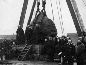 The Black Rock memorial marking the graves of typhus victims is lowered into place in 1859.