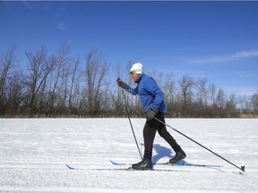 Paul Jarry, 84, cross-country skis on a sunny day at the Cap-St-Jacques nature park in Pierrefonds on Monday, March 15.