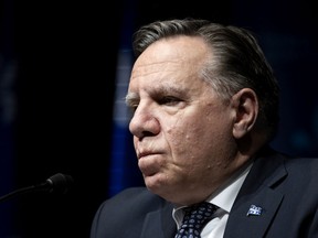 Quebec Premier François Legault speaks at a press conference on March 18, 2021.