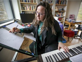 Composer Luna Pearl Woolf in her home studio in Outremont. Her album Fire and Flood was nominated for a Grammy Award for best classical compendium.