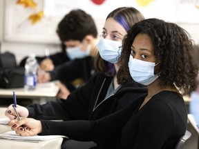 Students in class at John Rennie High School in Pointe-Claire last year.