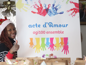 Christella Tchicaya, founder at Acte d’Amour, giving gifts at Christmas.