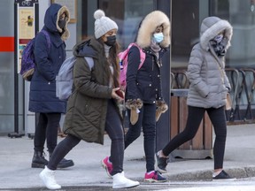 Pedestrians bundle up in Montreal.